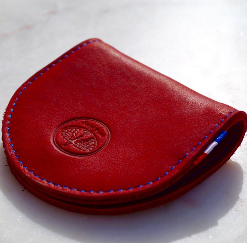 Porte monnaie en cuir de couleur rouge