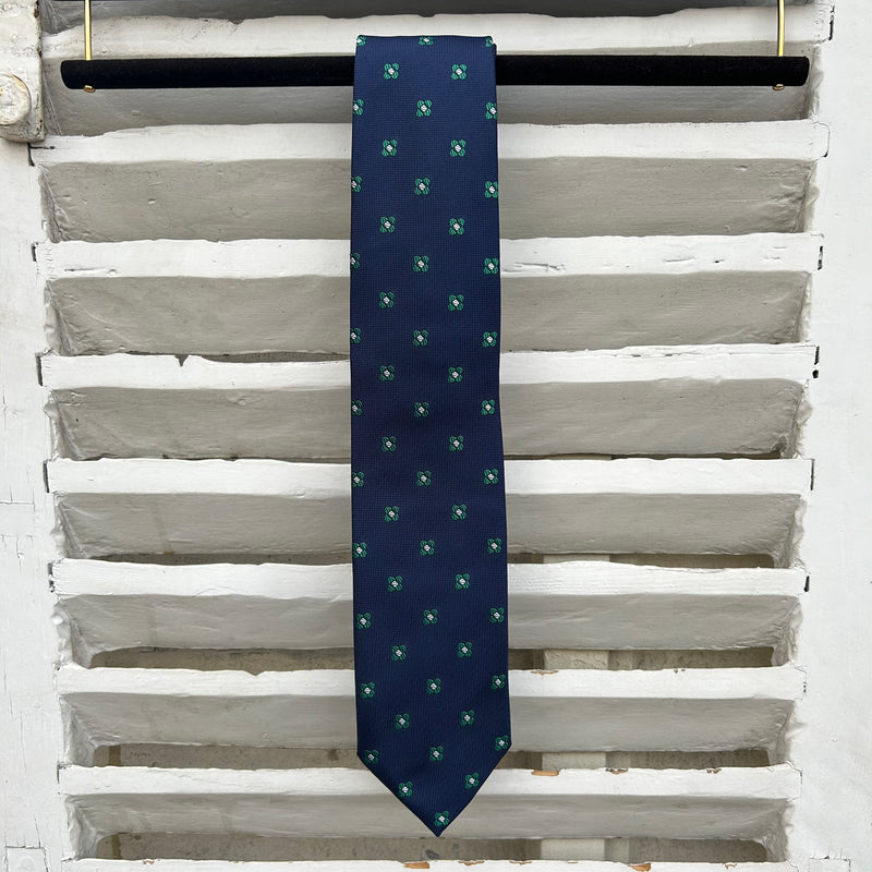 Cravate bleu marine motifs fleurs vertes 35