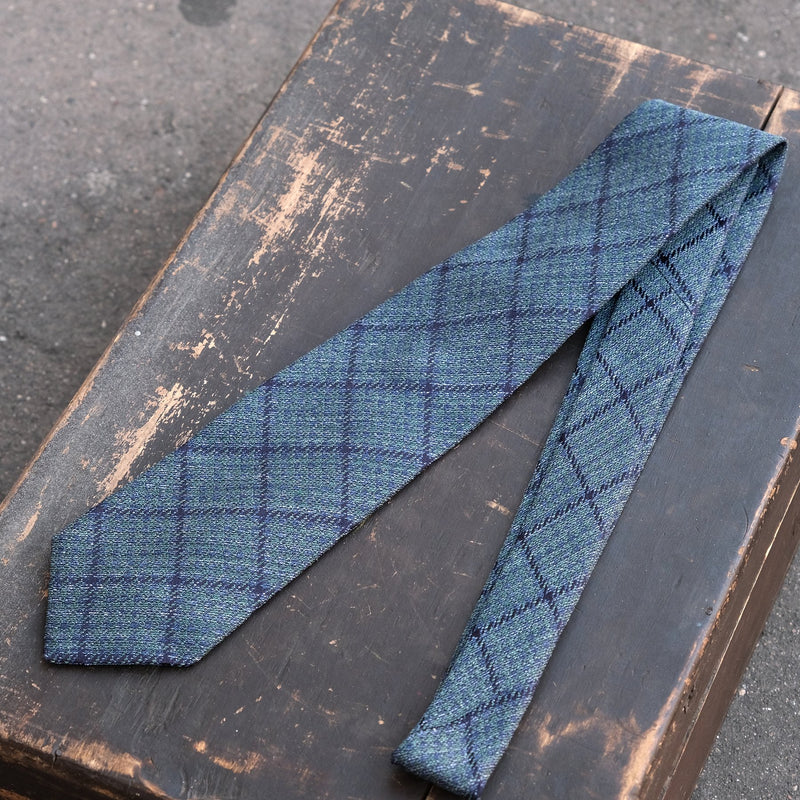 Cravate à carreaux bleu et vert