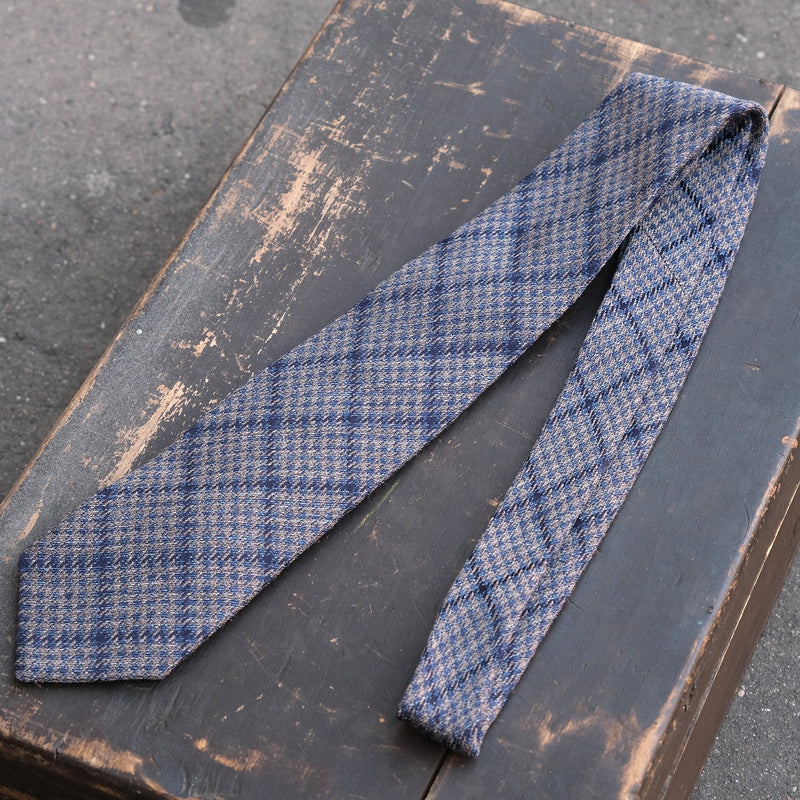 Cravate à carreaux bleus et beiges